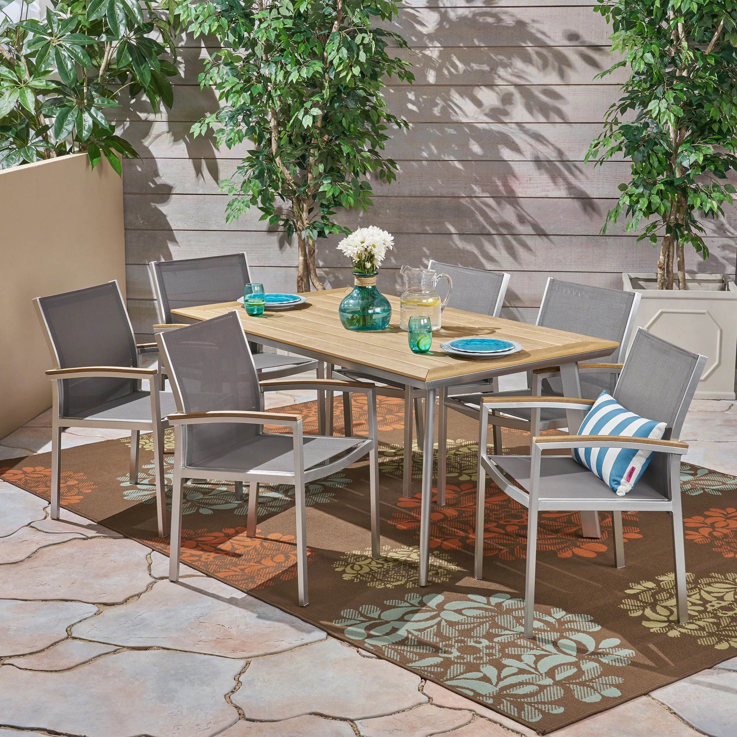 Erma Outdoor Aluminum 7-Piece Dining Set with Mesh Chairs and Faux Wood Top